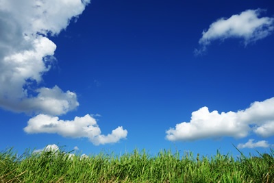 image of blue skies and green field representing  the big picture of marketing strategy